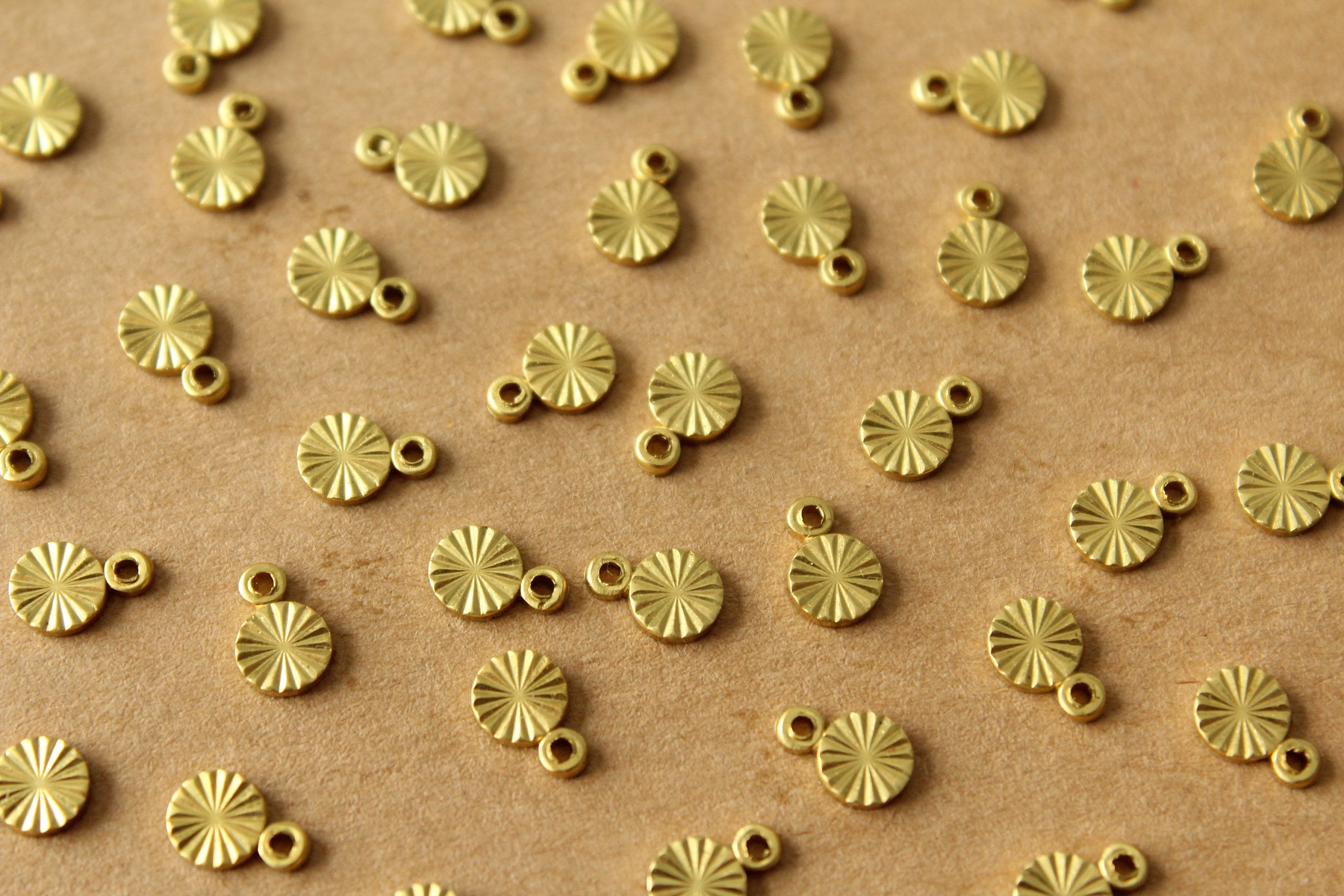 16 pc. Tiny Raw Brass Textured Circle Charms with Starburst Design: 7mm by 5mm- made in USA | RB-811*