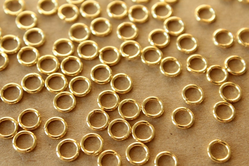 100 pc. 6mm 18k Gold Plated Stainless Steel Jumprings, 18 gauge FI-212 image 1