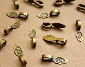 25 pc. Antique Bronze Glue-On Bails: 26mm by 8mm | FI-269