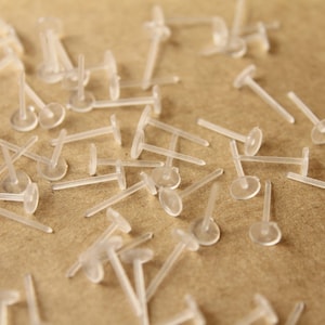 200 pc. Plastic Earring Posts, 5mm pad | FI-156