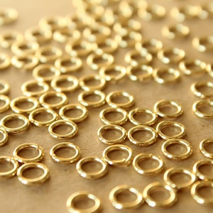 100 pc. 6mm 18k Gold Plated Stainless Steel Jumprings, 18 gauge FI-212 image 2