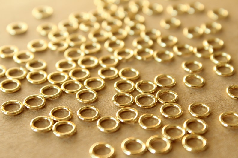 100 pc. 6mm 18k Gold Plated Stainless Steel Jumprings, 18 gauge FI-212 image 2