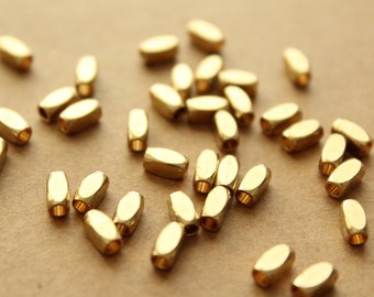 36 pc. Raw Brass Faceted Rectangular Tube Beads, 6mm by 3mm | FI-497