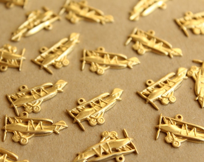4 pc. Raw Brass Antique Airplane Charms: 23mm by 14mm - made in USA | RB-659