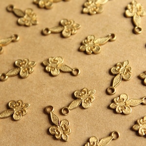 10 pc. Tiny Raw Brass Fleur de Lis Charms: 11.5mm by 6mm - made in USA | RB-810