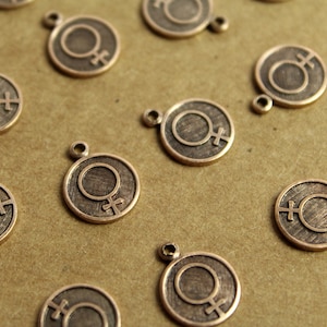 8 pc. Antique Brass Plated Female Symbol Coin Charms: 11mm by 13.5mm - made in USA | AB-156