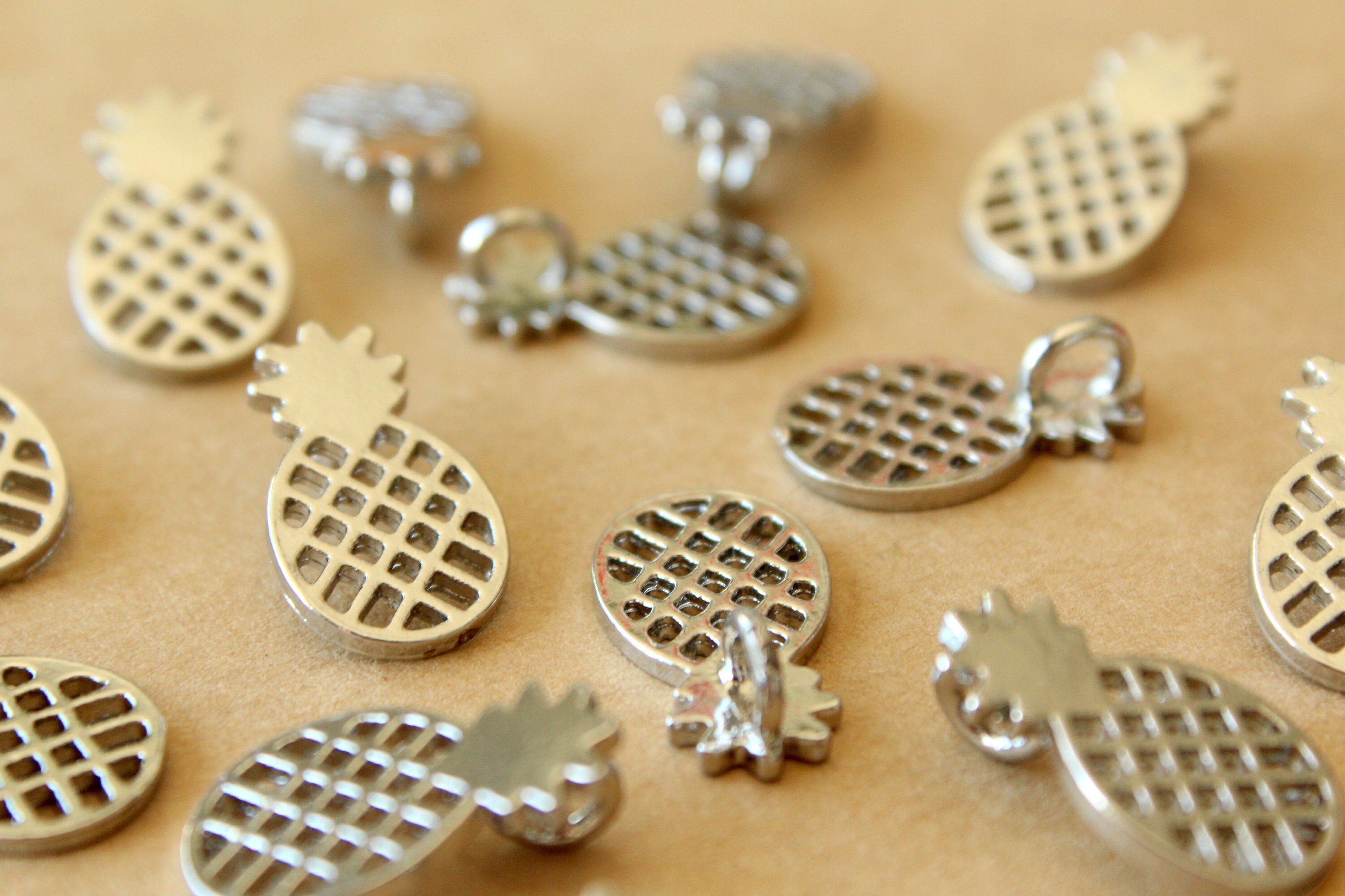 12 Pc. Silver Openwork Pineapple Charms, 20mm X 11mm | MIS