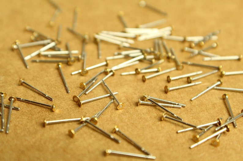 100 pc. Stainless steel earring posts with raw brass pads, 2mm pad FI-597 image 1