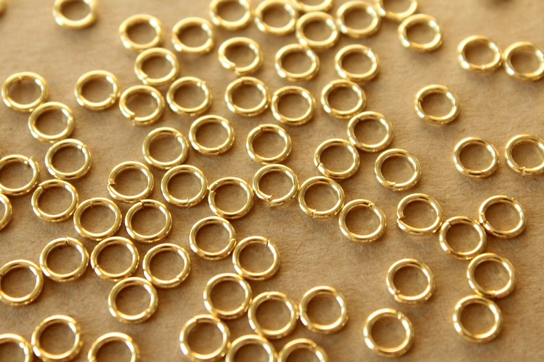 100 pc. 6mm 18k Gold Plated Stainless Steel Jumprings, 18 gauge FI-212 image 3