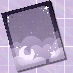 May include: A rectangular notepad featuring a dark purple grid background with a night sky theme. The design includes soft light purple clouds, a crescent moon, and various white four-pointed stars scattered across the page.
