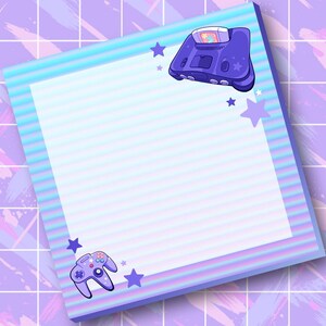 May include: A square notepad with light blue horizontal lines and a border featuring a purple retro video game console, a matching purple game controller, and several small purple stars against a light blue and purple striped background.