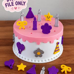 May include: A white and pink round cake-shaped object with a text bubble reading DIGITAL FILE ONLY. The top and sides feature holes for inserting various plastic shapes including purple party hats, silver candles, yellow stars, yellow bows, and purple flowers.