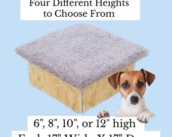 May include: A gray, carpeted dog bed with a wooden frame. The bed is available in four different heights: 6 inches, 8 inches, 10 inches, or 12 inches. Each bed is 17 inches wide and 17 inches deep.