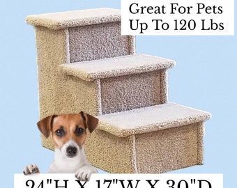 May include: Beige pet stairs with three steps, made of a soft, textured fabric. The stairs are 24 inches high, 17 inches wide, and 30 inches deep. A small dog is peeking out from behind the stairs. "Great For Pets Up To 120 Lbs" is written in black text on a white background.