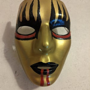 Masque réplique de Joey Jordison, joueur des Golden Retrievers de l'Iowa