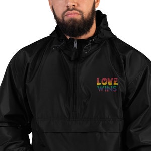 Love Wins Embroidered Champion Packable Jacket | Pride outerwear, rainbow love, Love is Love, hiking jacket, embroidery, LGBTQ+