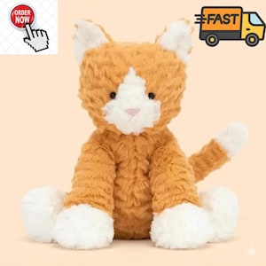 May include: A plush cat toy with orange and white fur. The cat has a white face, white paws, and a white tail tip. It features dark eyes and a small pink nose. The texture of the fur is soft and shaggy, giving the stuffed animal a fuzzy appearance.