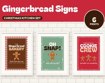 Könnte beinhalten: Ein Set aus sechs weihnachtlichen Küchenschildern mit Lebkuchenmännern. Die Drucke enthalten Texte wie The Gingerbread Bakery, Oh Snap! Who ate my leg? und Christmas Cookie Crew in den Farben Rot, Braun und Grün.