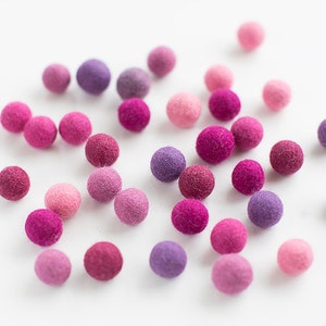 50 felt wool balls 1/2 in. size pink and purple color shades image 1