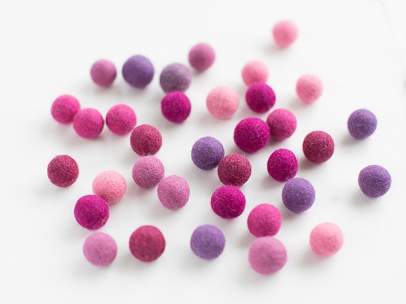 50 felt wool balls 1/2 in. size pink and purple color shades image 1