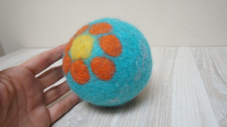 Big felt turquoise wool rattle ball, flower glitter extra large felted polka dots blue orange baby cat dog pet toddler toy game big children zdjęcie 1