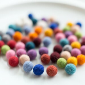 Pastel 50 felt wool balls 1/2 in. size green yellow grey blue pink white beige yellow art craft supply handmade in Lithuania powder soft image 4