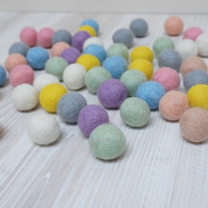 Pastel 50 felt wool balls 1/2 in. size green yellow grey blue pink white beige yellow art craft supply handmade in Lithuania powder soft image 1