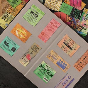 Concert ticket stickers on a scrapbook page