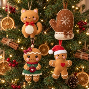 May include: Four felt Christmas tree ornaments: a tan cat with a red bow, a brown mitten with white snowflake embroidery, a gingerbread person in a green dress holding a red mug, and a gingerbread person wearing a red Santa hat.