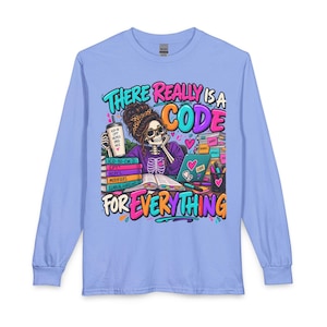 May include: A light blue long-sleeve t-shirt featuring a graphic of a skeleton at a desk with books, a laptop, and a tumbler. The text reads There Really Is A Code For Everything, with labels like ICD-10, CPT, HCPCS, DRG, and HCC visible on items.
