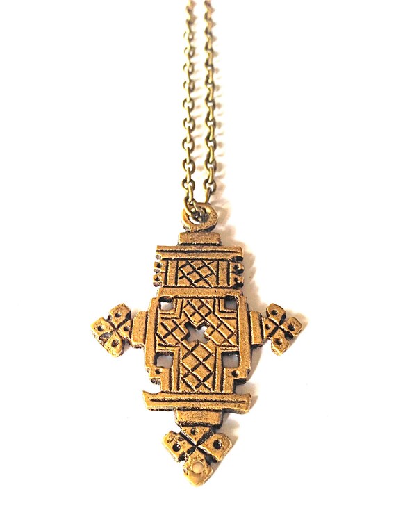 Items similar to Hand Carved Ethiopian Cross Necklace on Etsy