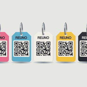 May include: Five rectangular luggage tags in pink, blue, white, yellow, and black, each featuring a silver metal ring at the top. Every tag displays the word REUNO in black capital letters above a black and white square QR code graphic.