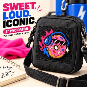 Pode incluir: Uma bolsa transversal quadrada preta com um patch de PVC de 7,62 cm de um donut rosa usando fones de ouvido azuis e óculos de sol. O patch inclui um raio azul e chamas rosas. O texto na imagem diz SWEET. LOUD. ICONIC. 3" PVC PATCH PVC ONLY.