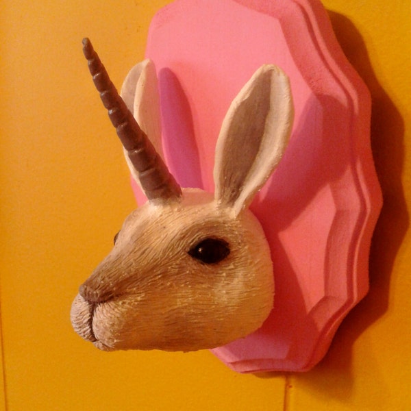 Mounted rabbit with unicorn horn