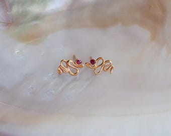 14k Asymmetrical Snake Stud Earrings with Red Rubies
