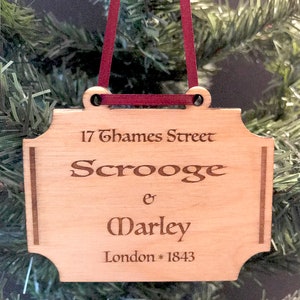 Scrooge and Marley sign Christmas ornament