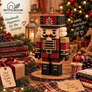 May include: A fabric nutcracker ornament featuring a red, green, and gold plaid pattern with gold embroidery details. The nutcracker has a moustache, a tall hat with a leaf emblem, and a hanging loop. Text includes Petite Room, Handmade Happiness for the Holidays, A Little Nutcracker A Lot of Joy, Small Crafts Brighter Days, and Craft Decorate Be Happy.