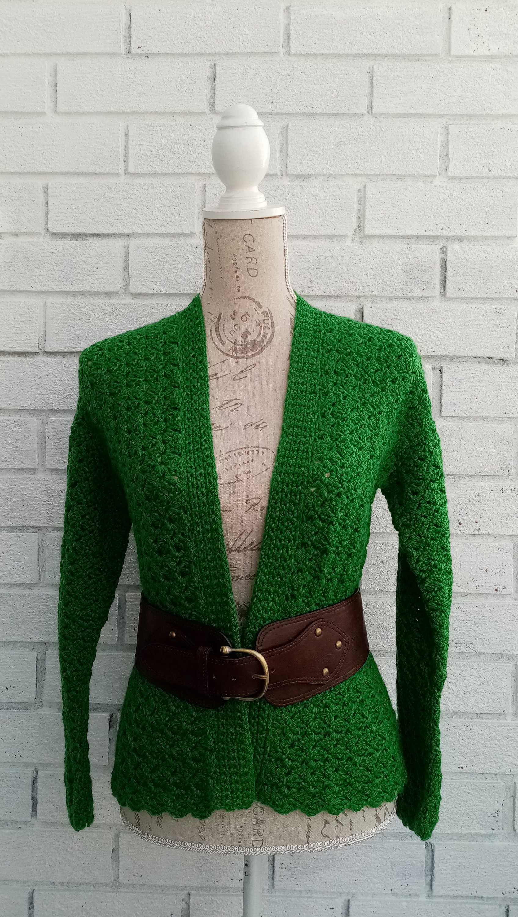30 Outlander Crochet Patterns for Shawls, Wraps, Capelets, and Cozy Accessories 24 Outlander-Inspired Emerald Peplum Cardigan Pattern