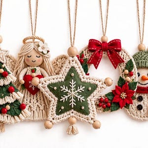 May include: Five hanging ornaments featuring a macrame Christmas tree with red berries, an angel with a red heart, a star with a snowflake, a wreath with a red bow and poinsettias, and a snowman wearing a green hat and red scarf.