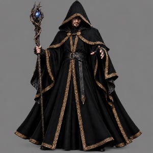 May include: A black hooded robe with gold trim and a matching belt, worn with a dark cloak featuring gold embroidery. The figure holds a tall, dark, twisted staff topped with a glowing blue orb, and wears dark fingerless gloves on both hands.