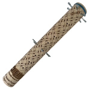 May include: A wooden knitting needle assist former with a woven pattern and metal pins. The former is 1 1/2 inches in diameter and has the text "Jigsaw Shop" and "Proudly Made in the USA" printed on it.