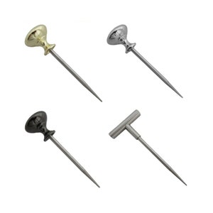 May include: Four different types of wine bottle stoppers. Two have a round knob on top, one has a T-shaped handle, and one has a black knob.