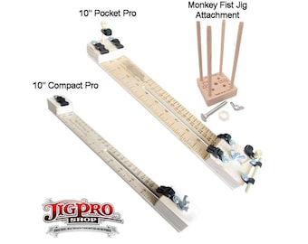 May include: Two wooden jig pro tools for making monkey fist knots. The 10" Pocket Pro and the 10" Compact Pro are shown with a Monkey Fist Jig Attachment. The attachment includes four wooden dowels, a metal bolt, a washer, and a nut.