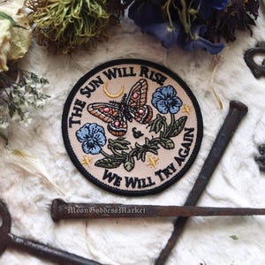 Vlinderstrijkpatch "The Sun Will Rise and We Will Try Again"