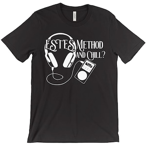 May include: Black t-shirt with white text that reads "Estes Method and Chill?" with a graphic of headphones and a vintage radio.