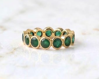 Emerald Eternity Ring: 18K Yellow Gold Milgrained Bezel Band
