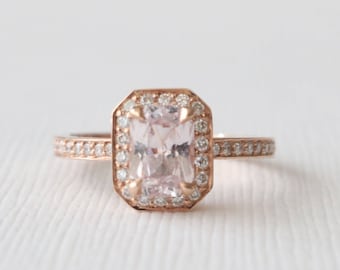 Anillo de oro rosa de 14 quilates con halo de diamantes y zafiro color melocotón de talla radiante, hecho a mano