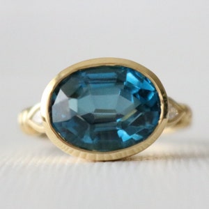 Oval London Blue Topaz Bezel Diamond Ring, Blue Gemstone Statement Ring in 14K Yellow Gold