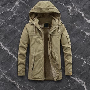 May include: A khaki-colored hooded jacket featuring a thick, brown faux-fur lining, a full-length front zipper, snap-button closures, two side pockets, and a small utility pocket on the left sleeve with a drawstring hood.