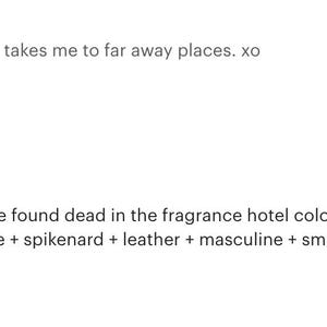 May include: A brown glass bottle with a white label, alongside other perfume bottles and green boxes. The text "the couple found dead in the fragrance hotel cologne + unisex + natural witch hazel base + spikenard + leather + masculine + smoky" is visible.